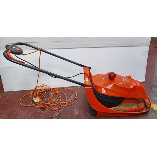 378 - A Flymo Hover vac 280 electric lawnmower in great condition. Complete and working.