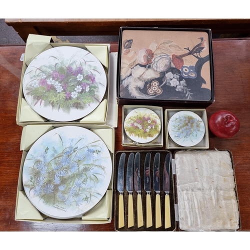 391 - A mixed lot of 6 items including a set of 12 place mats and 12 coaster by Kelsey, a set 5 stainless ... 