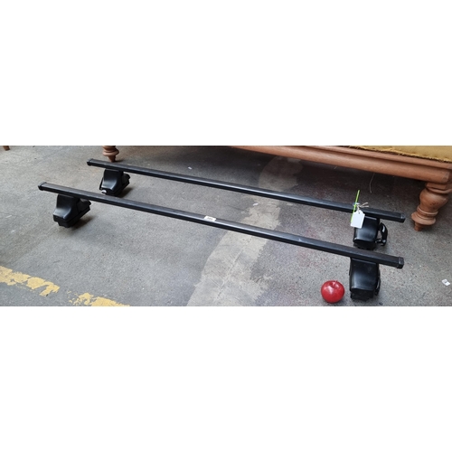 395 - Two Thule Sweden adjustable roof racks. Mm: max size 136cm with keys.