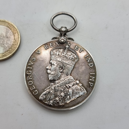 406 - A Sterling Silver George the Fifth Coronation medal, circa 1911. In super fine condition. Weight of ... 