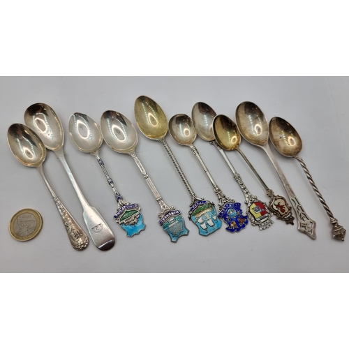 411 - A great collection of nine assorted sterling silver souvenir tea spoons. With a total weight of 95.7... 