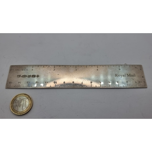 416 - A sterling silver 6 inch ruler, hallmarked Sheffield. Stamped 