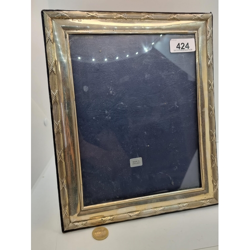 424 - A very large sterling silver (hallmarked London) glaze and velvet lined photo frame. With internal m... 