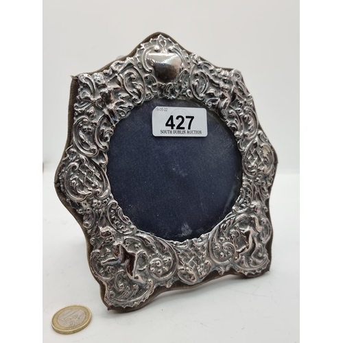 427 - A vintage sterling silver circular glazed photo frame. Internal measurements: 9.5 cm.