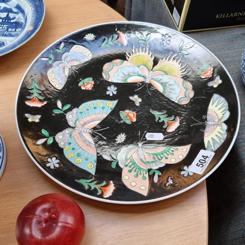 A large beautiful 19th century Chinese Butterfly plate. With colourful butterfly motif against black background. D32 cms. In Very good condition.