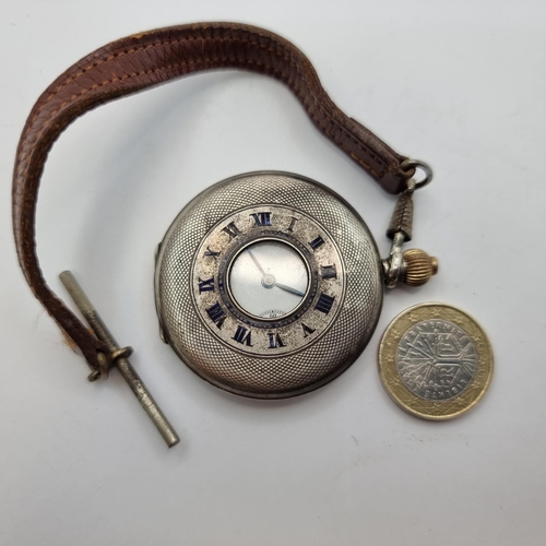 53 - A silver cased half hunter pocket watch, with white enamelled dial and roman numerals with subsidiar... 