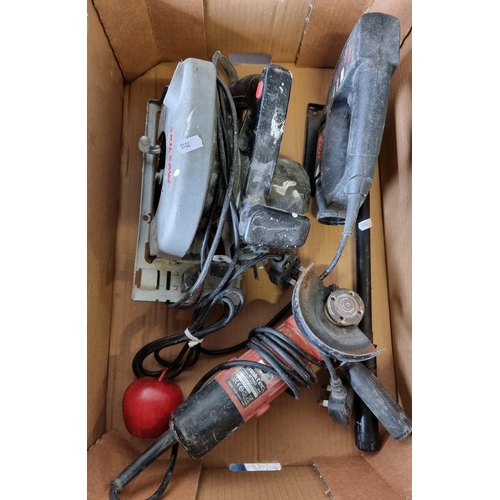 787 - Three electric tools consisting of a circular saw, a jigsaw and an angle grinder.