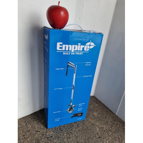 792 - An Empire Measuring wheel, 150mm, brand new in its original box.