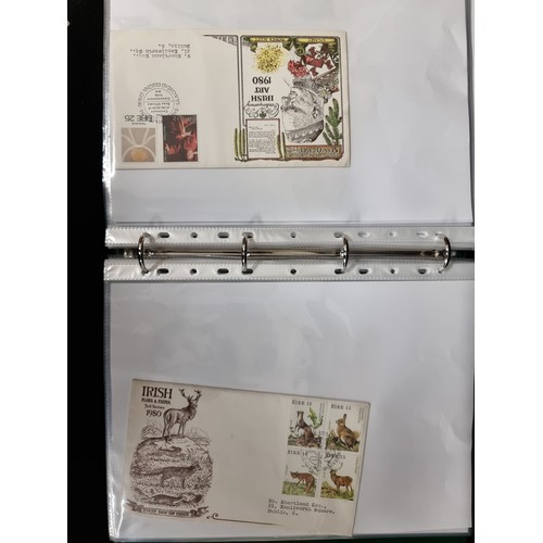 167 - A high quality stamp album, containing approximately forty Irish first day covers. Many of which are... 