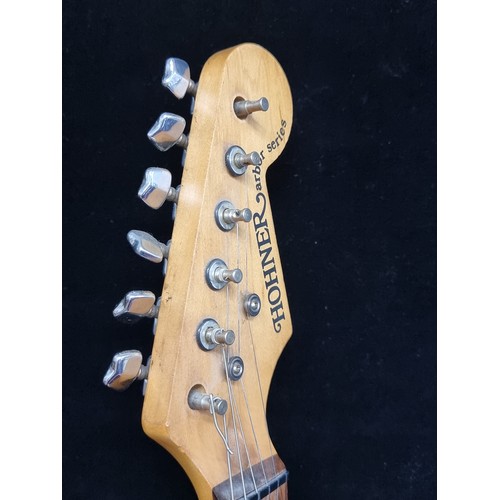 184 - A Hohner Arbor Series, Stratocaster style electric guitar in a vintage sunburst colourway, with a wh... 