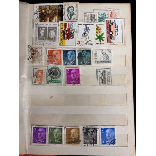 191 - A fascinating vintage stamp album, containing in particular a number of early 20th century Malaysian... 