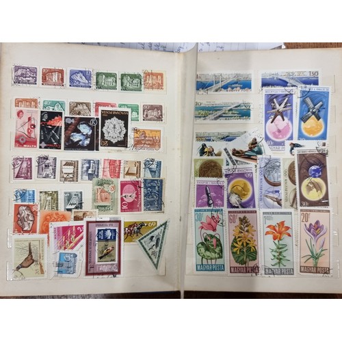 203 - Two beautiful vintage stamp albums, both filled completely with International stamps from countries ... 