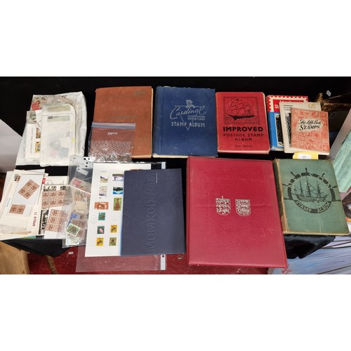 205 - A very large Collection of Stamps in a big file box including 5 full stamp albums, 4 x 1969 Moon lan... 