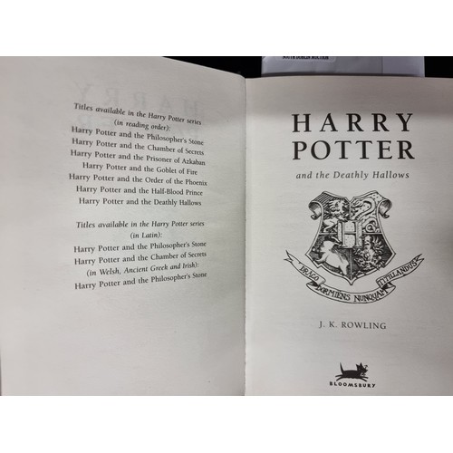 234 - A hardback first edition copy of the book: ''Harry Potter and the Deathly Hallows''. Published by Bl... 