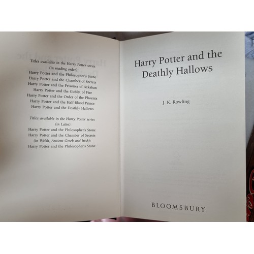 318 - A Hard back first edition copy of Harry Potter and the Deathly Hollows by J.K. Rowling, published by... 