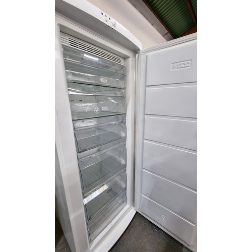 386 - A very tall Zunssi freezer in white with 6 shelves inside for ample storage. In super condition, Fro... 