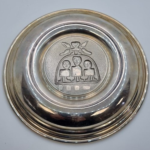 403 - An Irish silver dish, in heavily chashed design taken from the high cross at Moone, County Kildare (... 