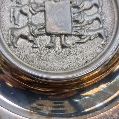 404 - An Irish silver embossed Dublin dish depicting a Celtic design of a Shepherd and his flock by Dougla... 