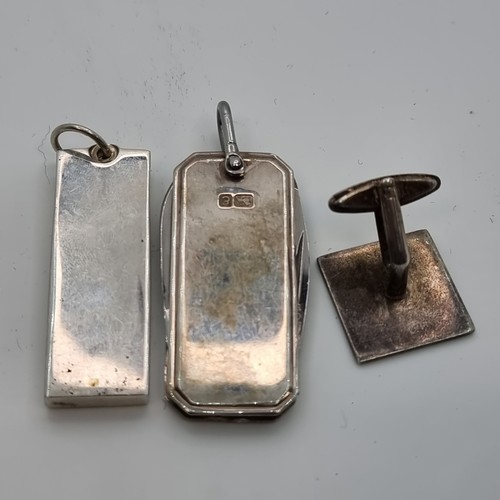 408 - A collection of three hallmarked sterling silver items, including a silver ingot, pen knife and cuff... 