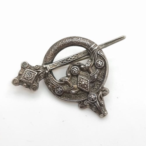 410 - A collection of silver items, consisting of pendants, necklaces and a Celtic design brooch and ring.... 