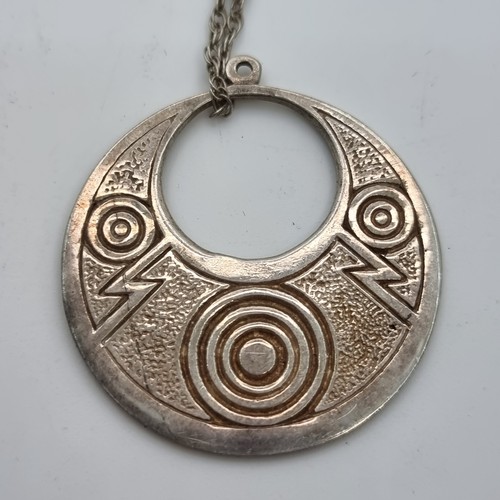 410 - A collection of silver items, consisting of pendants, necklaces and a Celtic design brooch and ring.... 