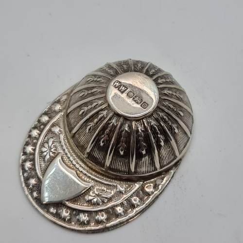 412 - A sterling silver jockey cap with blank cartouche to rim. Hallmark is Sheffield, makers mark W.W She... 