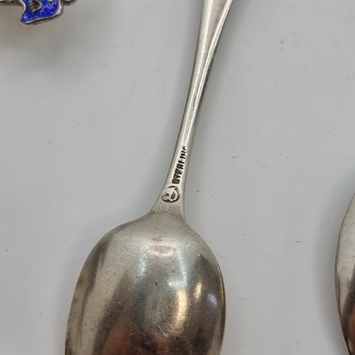 411 - A great collection of nine assorted sterling silver souvenir tea spoons. With a total weight of 95.7... 