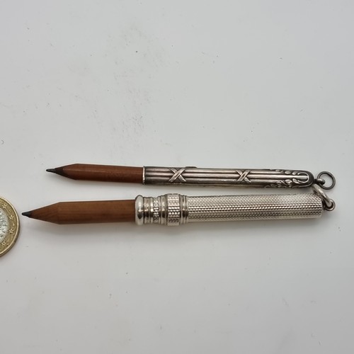 419 - Two sterling silver pencil holders, one example is marked Samuel Morden and Co. Total weight: 16.55 ... 