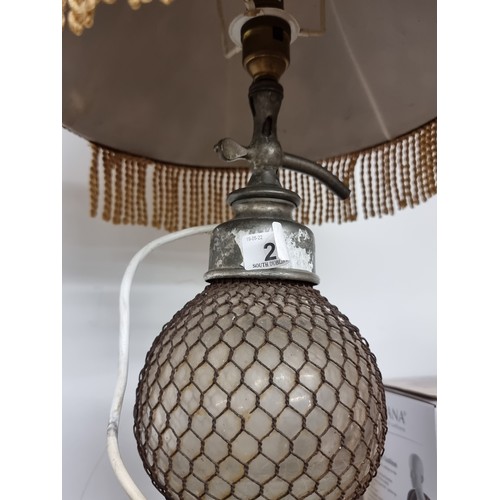 210 - A highly unusual table lamp with an antique seltzer siphon bottle base by Seltzogene D. Fevre of Par... 