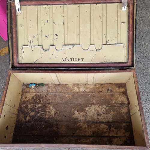 791 - A very large vintage metal trunk with carry handle and a large clasp lock system.