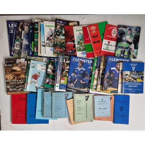 805 - A large collection of vintage Irish rugby programs and magazine, primarily from the 1980's.