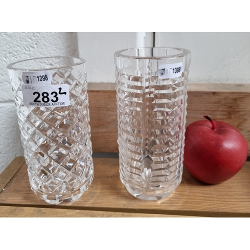 283 - Two tall, narrow bud vases by Waterford crystal including the Alana pattern. Etched in very good con... 