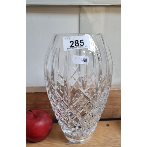 285 - A Waterford Crystal vase in the Lismore pattern, in good condition. With acid mark to base. In super... 