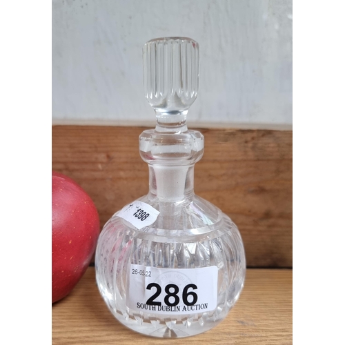 A vintage Waterford Crystal perfume bottle with original stopper and dauber. A beautiful example with acid mark and original sticker. In super condition.