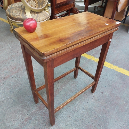 361 - A stunning vintage fold out games table with straight legs and stretchers in very good condition. Mm... 