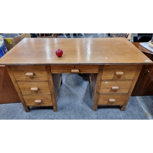 532 - Very handsome vintage golden oak desk, Circa 1930s with seven drawers. In good order.