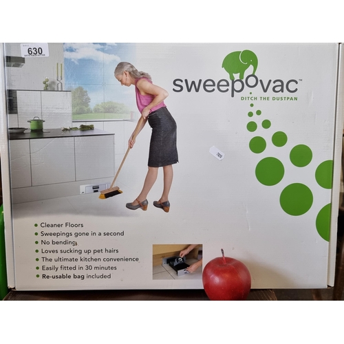 630 - A Sweepovac plinth vacuum, a floor installed bin where one can sweep dust and have it be sucked into... 