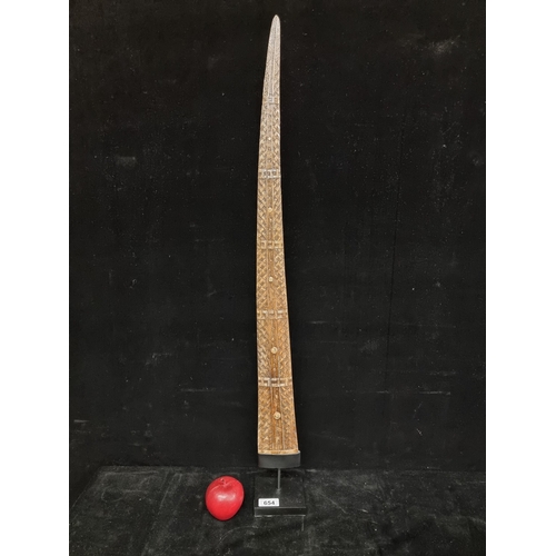 654 - Star Lot : A stunning intricately carved swordfish bill mounted on a metal base. Mm: 90cm high. Supe... 
