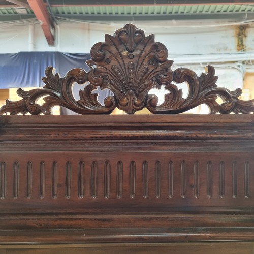 400 - An absolutely stunning standing bevelled dressing mirror with an elaborate carved frame, clawed feet... 