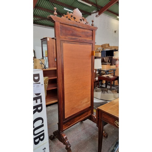 400 - An absolutely stunning standing bevelled dressing mirror with an elaborate carved frame, clawed feet... 