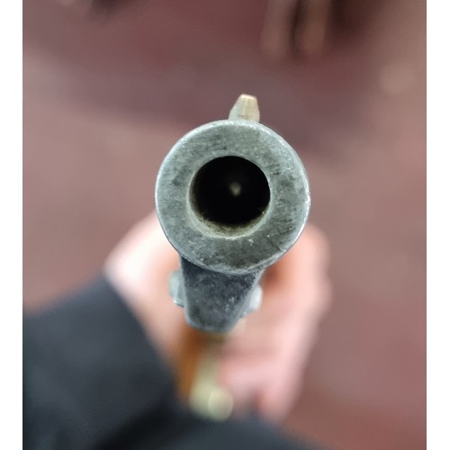 619 - A replica BKA98 percussion revolver along with a genuine leather holster. Good weight and action wor... 