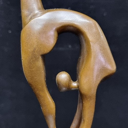 642 - A very striking bronze sculpture of a stylized female gymnast preparing to flip, after Miguel Fernan... 