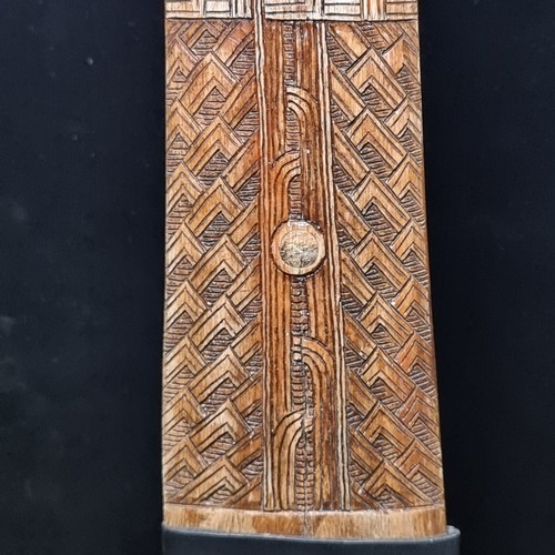 654 - Star Lot : A stunning intricately carved swordfish bill mounted on a metal base. Mm: 90cm high. Supe... 