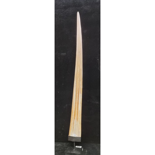 654 - Star Lot : A stunning intricately carved swordfish bill mounted on a metal base. Mm: 90cm high. Supe... 