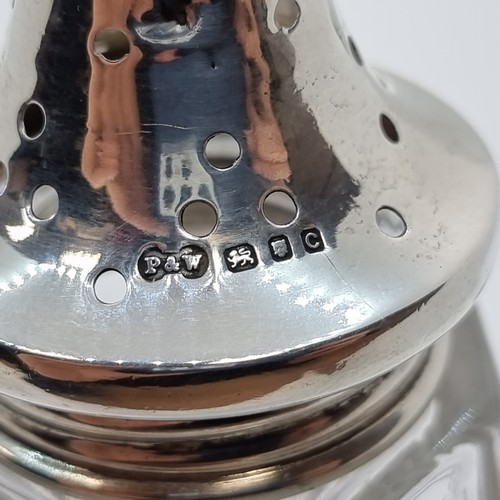 649 - A nice example of a sterling silver topped cut glass sugar shaker. Hallmarked London, circa 1931 and... 