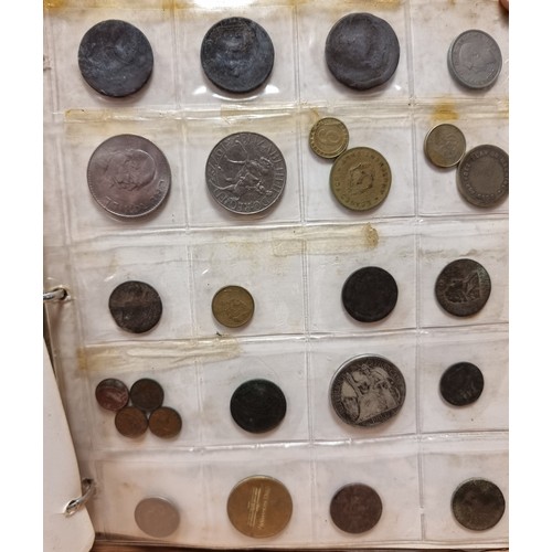 653 - A very large collection of approximately 300 coins, contained neatly in a coin mounted album. This c... 