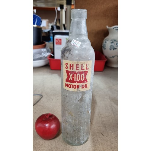 636 - Two fabulous 1950's galvanised motor oil bottle crates. Including one large Shell oil bottle.