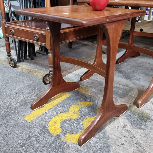 614 - A set of three teak mid-century G Plan nesting tables in very good condition.