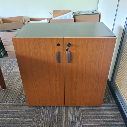 91 - Exectutive office furniture. Curved large desk, matching side table and similar two door cabinet. Su... 