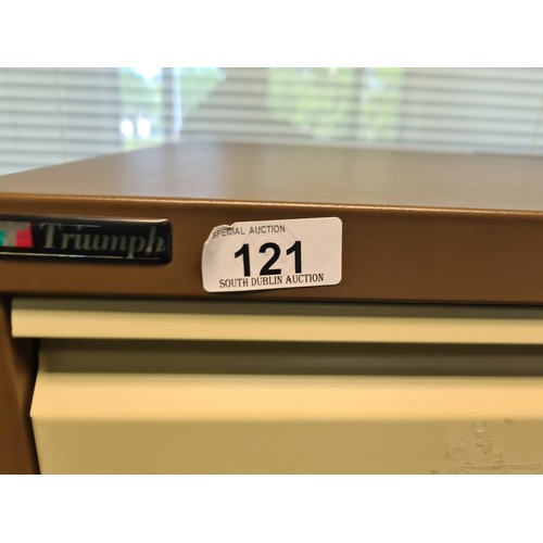 121 - Four nice and clean Triumph 4 drawer file cabinets. In coffee and cream. Located down stairs in trai... 